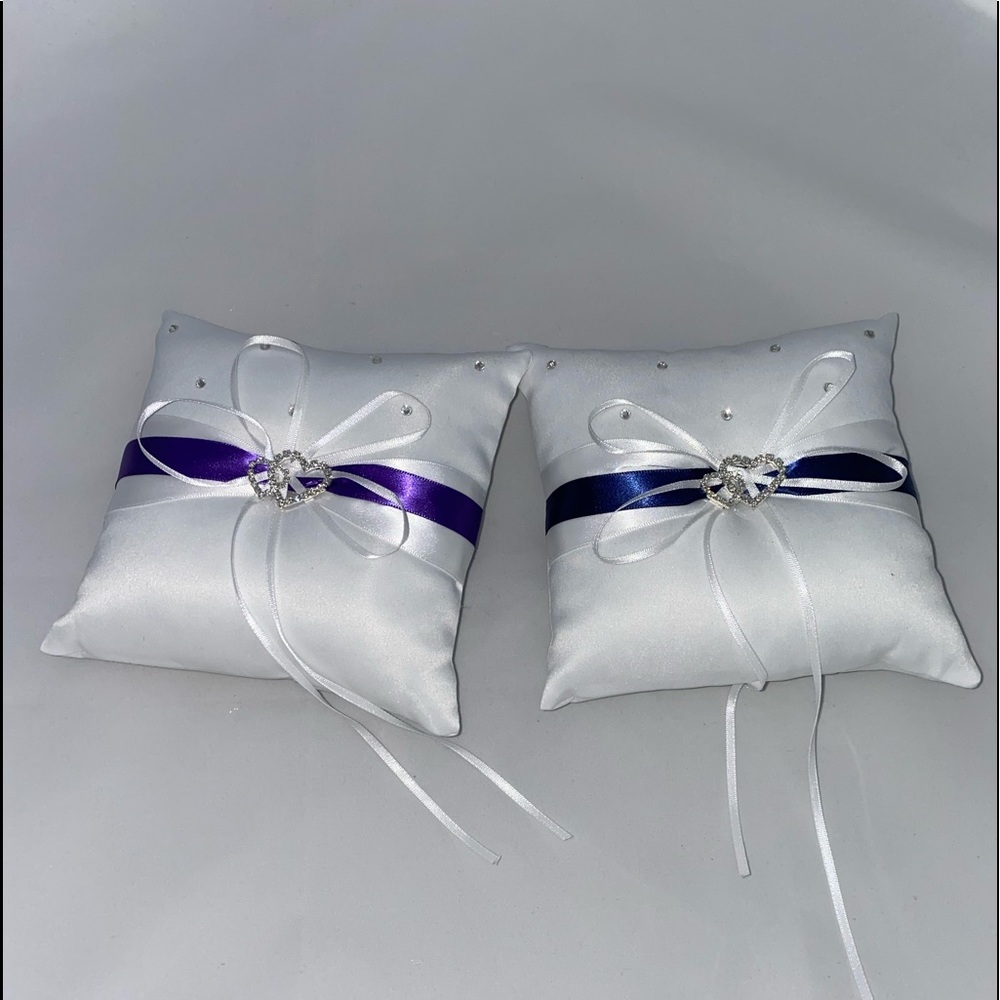 Ring bearers pillows. One purple, one blue